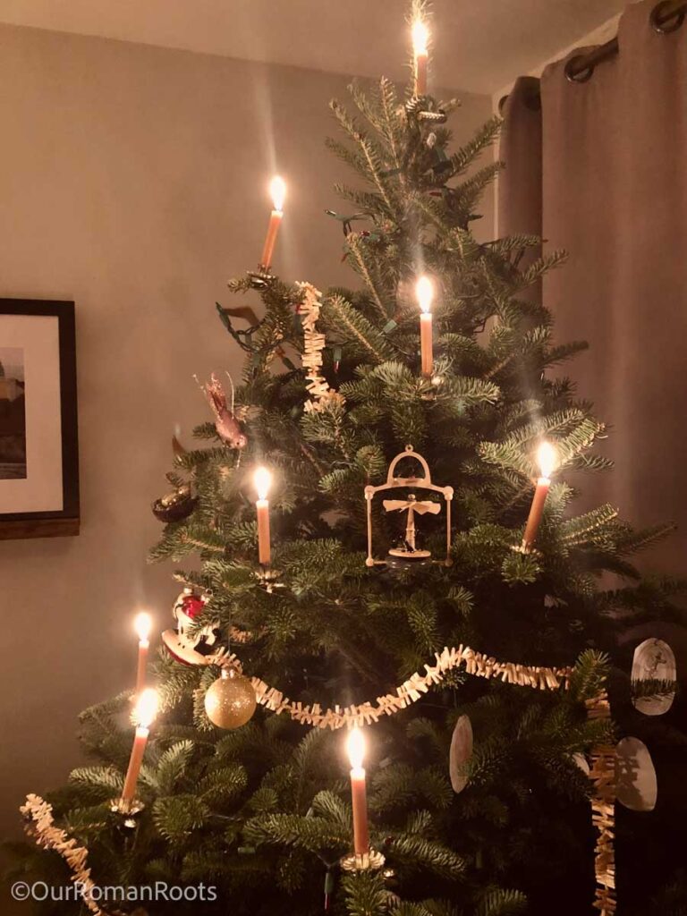 Traditional Christmas tree with real candles.